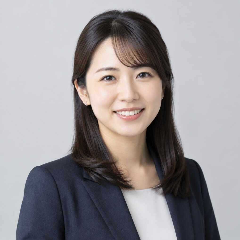 Studio portrait of a Japanese woman in her late 20s wearing a blazer
